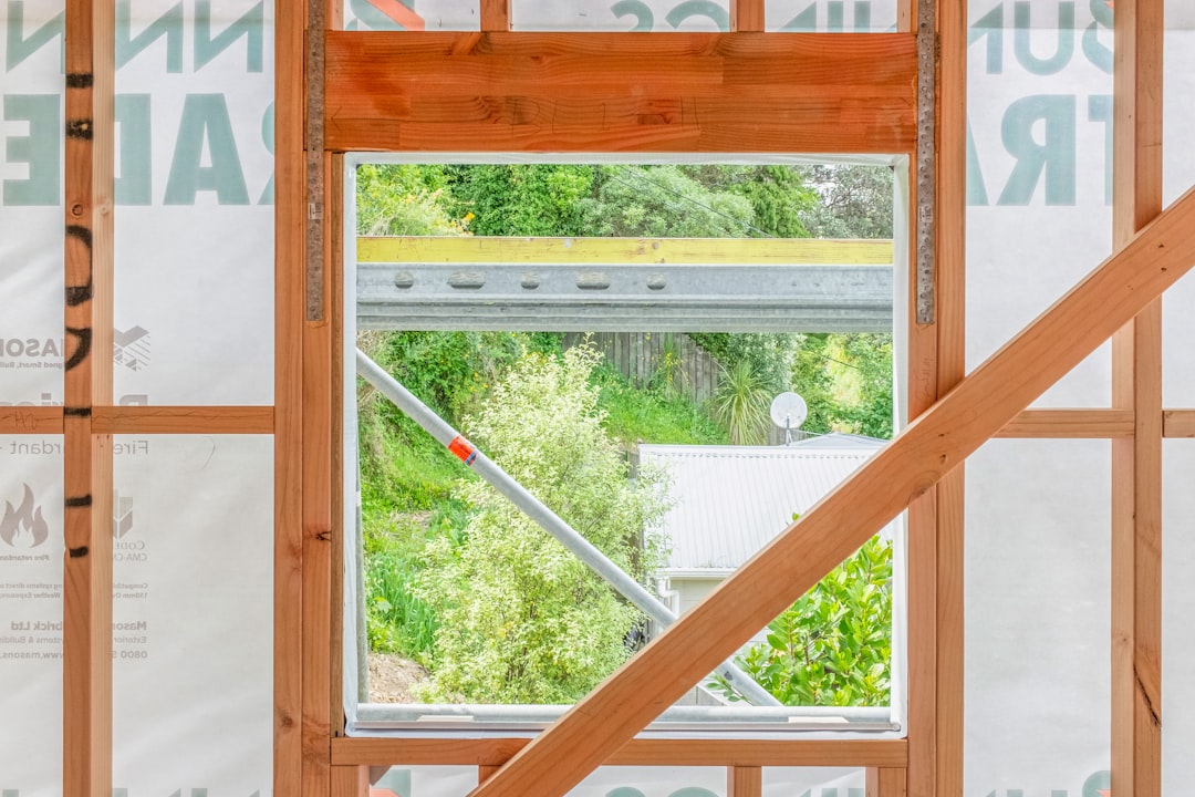 View through window frame of construction site